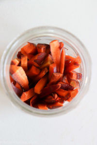 Organic Carrots placed in jar